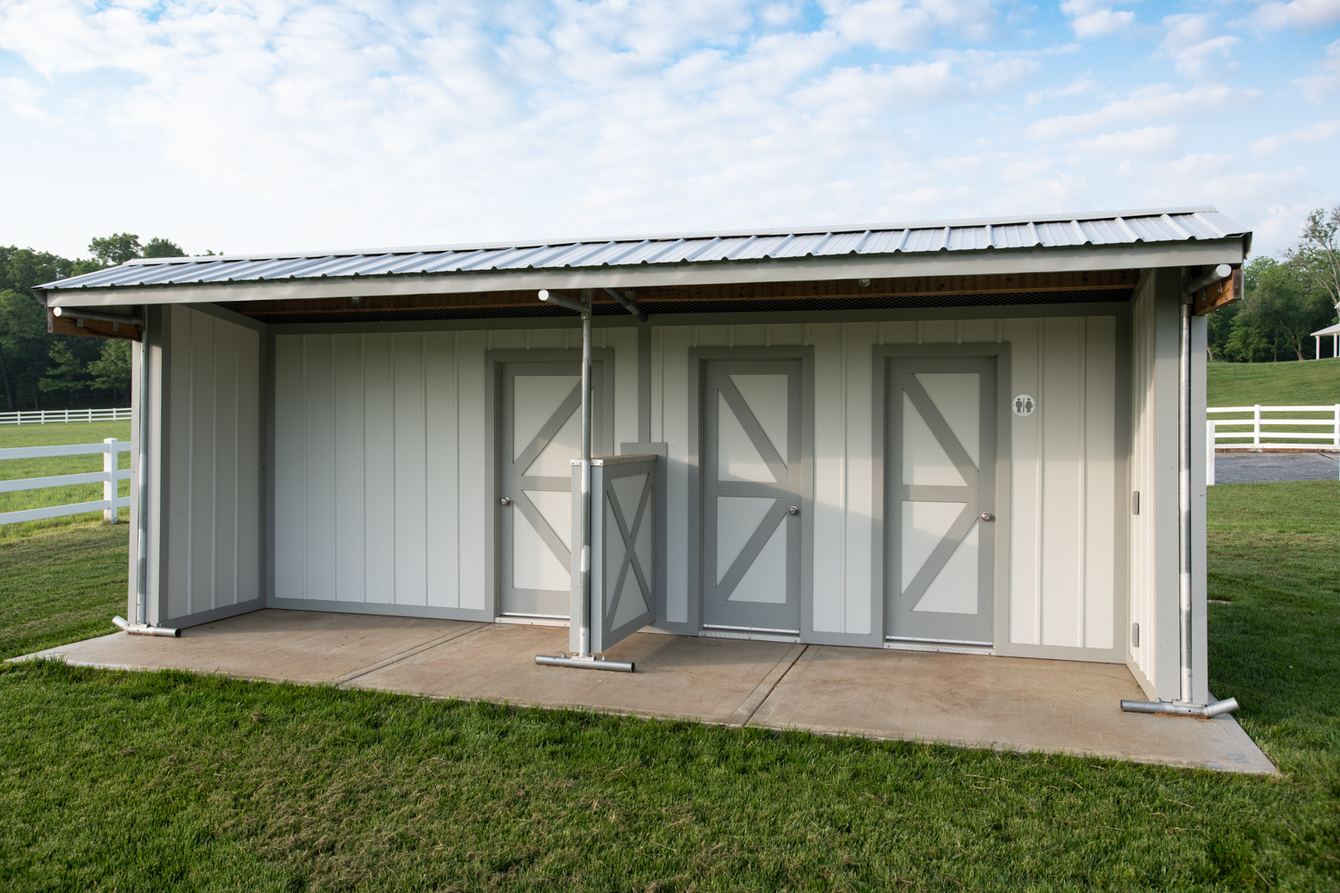 Restroom and storage shed at Hidden Timber Farm horse pasture boarding